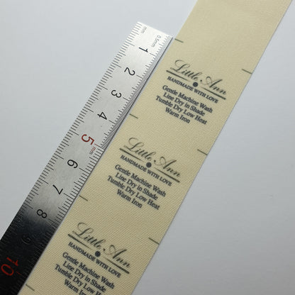 #03PC - UNBLEACHED POLY/COTTON LABELS WITH LOGO &/OR INFO