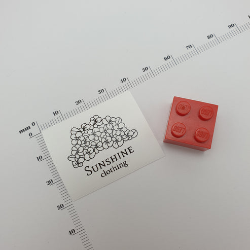 #12 - SEMI-PERMANENT PRINTED POLYESTER TAPE STRAIGHT CUT SEW-ON-FLAT LABELS
